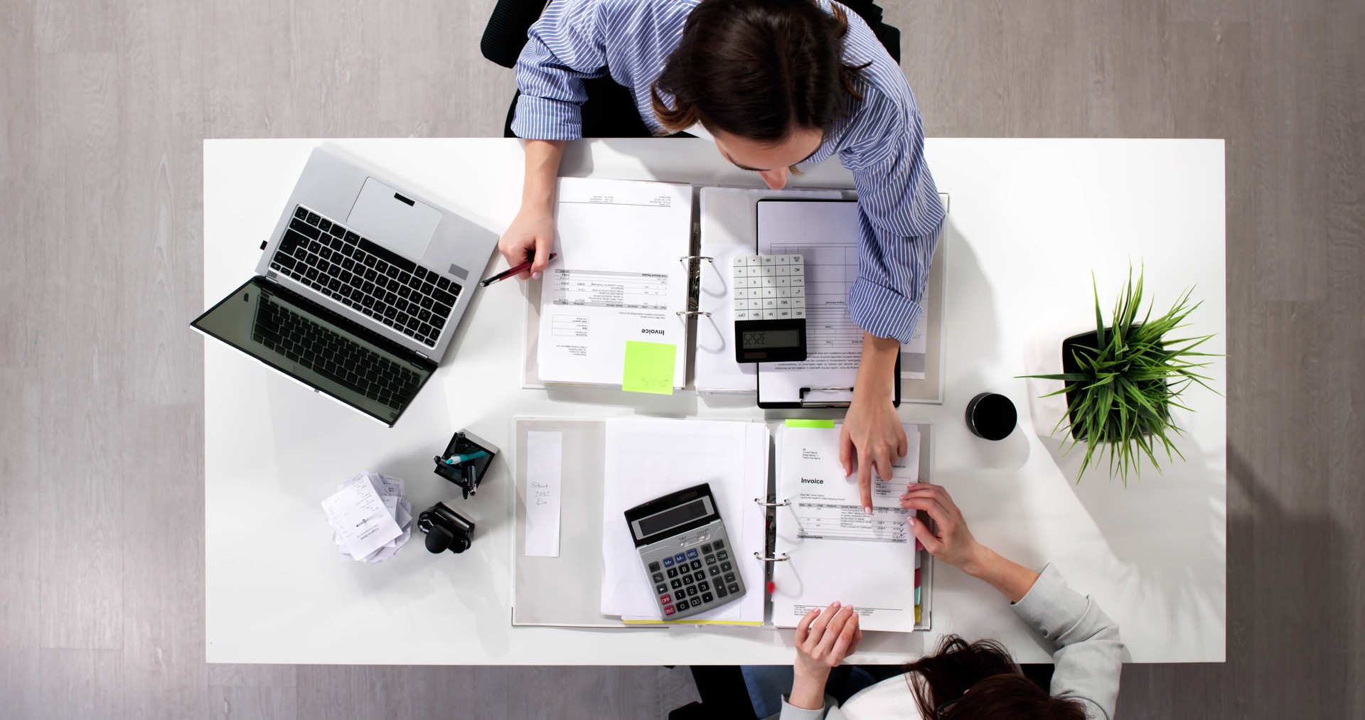 Busy accountants working on tax audits and compliance in the office
